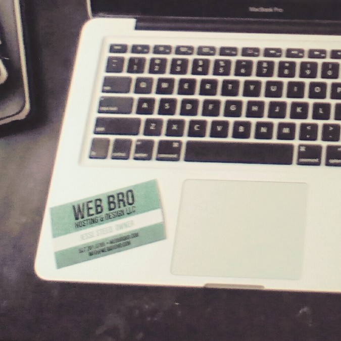 Business card on laptop